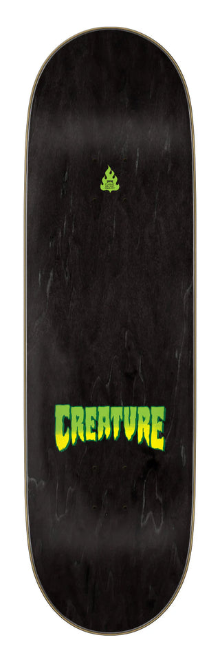 Creature 9.0 Logo Spray Stumps skateboard deck with green spray fade graphic.