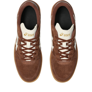 ASICS SKYHAND OG in reddish brown and oatmeal with suede panels, gum outsole, and retro handball-inspired silhouette.