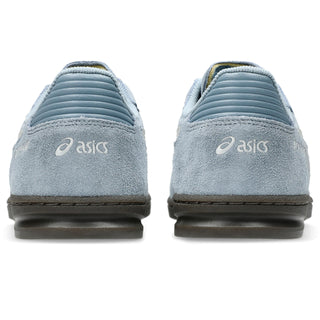 ASICS SKYHAND OG Shoes in Slate Blue/Lake Grey — retro court silhouette with 1990s handball heritage, synthetic leather and suede upper, FLYTEFOAM® PROPEL cushioning, EVA heel wedge, and gum rubber outsole