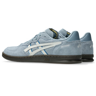 ASICS SKYHAND OG Shoes in Slate Blue/Lake Grey — retro court silhouette with 1990s handball heritage, synthetic leather and suede upper, FLYTEFOAM® PROPEL cushioning, EVA heel wedge, and gum rubber outsole