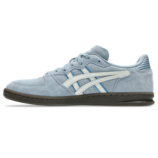 ASICS SKYHAND OG Shoes in Slate Blue/Lake Grey — retro court silhouette with 1990s handball heritage, synthetic leather and suede upper, FLYTEFOAM® PROPEL cushioning, EVA heel wedge, and gum rubber outsole
