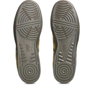 ASICS SKYHAND OG sneaker in hornet and spice curry with suede panels, gum outsole, and retro-inspired court silhouette.