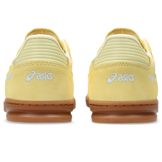 ASICS SKYHAND OG sneakers in wheat yellow and sunlight colorway with retro handball-inspired design, premium suede and mesh upper, and classic ASICS styling