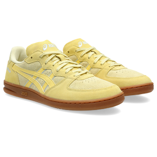 ASICS SKYHAND OG sneakers in wheat yellow and sunlight colorway with retro handball-inspired design, premium suede and mesh upper, and classic ASICS styling