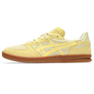 ASICS SKYHAND OG sneakers in wheat yellow and sunlight colorway with retro handball-inspired design, premium suede and mesh upper, and classic ASICS styling