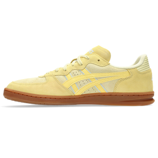 ASICS SKYHAND OG sneakers in wheat yellow and sunlight colorway with retro handball-inspired design, premium suede and mesh upper, and classic ASICS styling