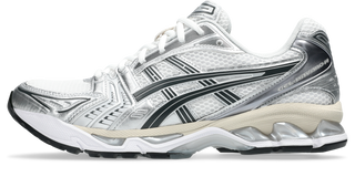ASICS GEL-KAYANO 14 in White/Graphite Grey with layered upper and GEL cushioning.