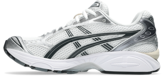 ASICS GEL-KAYANO 14 in White/Graphite Grey with layered upper and GEL cushioning.