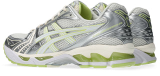 ASICS GEL-KAYANO 14 sneakers in Cream and Pistachio colorway with two-tone underlays and GEL® technology cushioning