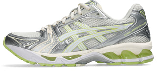 ASICS GEL-KAYANO 14 sneakers in Cream and Pistachio colorway with two-tone underlays and GEL® technology cushioning