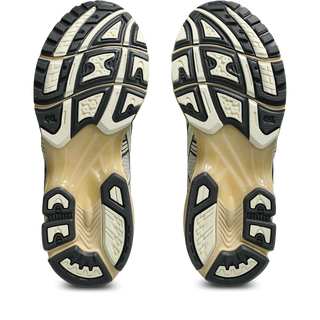 ASICS GEL-KAYANO 14 sneakers in Cream and Obsidian Grey with late 2000s-inspired design, GEL™ technology cushioning, TRUSSTIC® support system, and eco-friendly sockliner