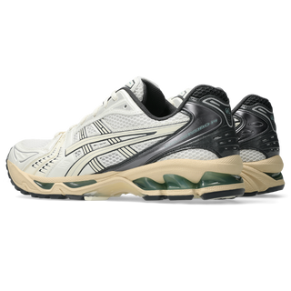 ASICS GEL-KAYANO 14 sneakers in Cream and Obsidian Grey with late 2000s-inspired design, GEL™ technology cushioning, TRUSSTIC® support system, and eco-friendly sockliner