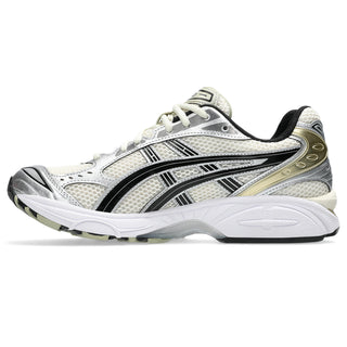 White running shoe with black and gray accents on a white background
