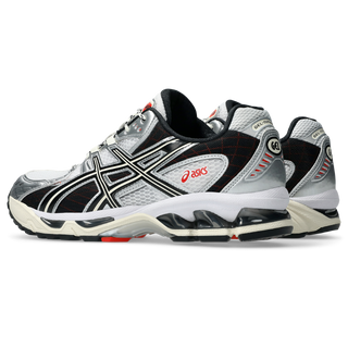 ASICS GEL-NIMBUS 10.1 in white and black with mesh upper, GEL® cushioning, and EVA midsole support.