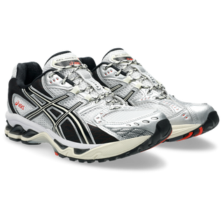 ASICS GEL-NIMBUS 10.1 in white and black with mesh upper, GEL® cushioning, and EVA midsole support.