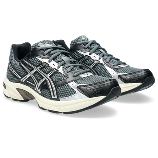 ASICS GEL-1130 sneaker in steel grey and black with mesh upper, GEL® heel cushioning, and TRUSSTIC® support system.