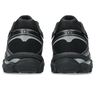 ASICS GEL-CUMULUS 16 sneakers in all-black colorway with glossy synthetic leather overlays and mesh underlays