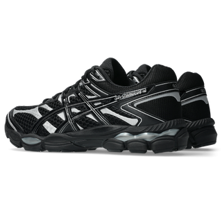 ASICS GEL-CUMULUS 16 sneakers in all-black colorway with glossy synthetic leather overlays and mesh underlays