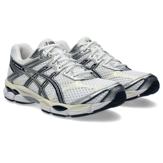 ASICS GEL-CUMULUS 16 running shoes in white and midnight colorway with synthetic leather overlays, breathable mesh, dual GEL technology cushioning, and 2010s design"