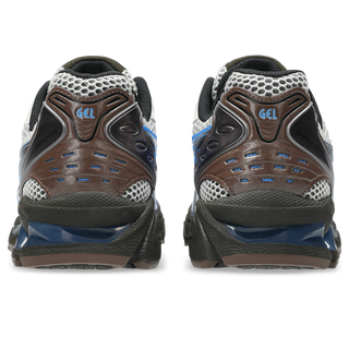 ASICS GEL-KAYANO 14 sneakers in Cream and Blue Coast colorway with retro 2000s design and two-tone underlays