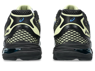 ASICS GEL-K1011 Soft Yellow/Black with layered upper and dual GEL® cushioning.
