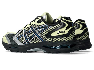 ASICS GEL-K1011 Soft Yellow/Black with layered upper and dual GEL® cushioning.