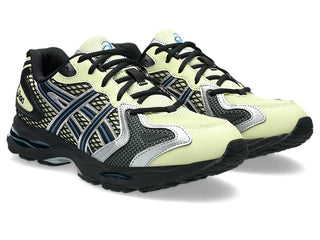 ASICS GEL-K1011 Soft Yellow/Black with layered upper and dual GEL® cushioning.