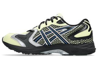 ASICS GEL-K1011 Soft Yellow/Black with layered upper and dual GEL® cushioning.