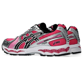 ASICS GEL-KAYANO 12.1 in Dragon Fruit and Black with layered mesh upper and metallic-inspired overlays.