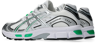 ASICS GEL-Stratus MC Sneakers in White/Cilantro — synthetic leather overlays and air mesh upper with internal rearfoot GEL technology and 2010s running shoe midsole construction.

