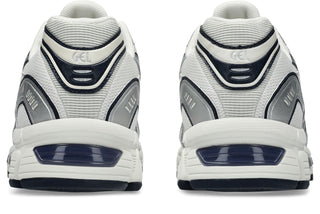ASICS GEL-Stratus MC Sneakers in Cream/Pure Silver — synthetic leather overlays and air mesh upper with internal rearfoot GEL technology and 2010s running shoe midsole construction.

