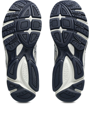 ASICS GEL-Stratus MC Sneakers in Cream/Pure Silver — synthetic leather overlays and air mesh upper with internal rearfoot GEL technology and 2010s running shoe midsole construction.

