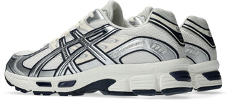 ASICS GEL-Stratus MC Sneakers in Cream/Pure Silver — synthetic leather overlays and air mesh upper with internal rearfoot GEL technology and 2010s running shoe midsole construction.

