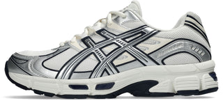ASICS GEL-Stratus MC Sneakers in Cream/Pure Silver — synthetic leather overlays and air mesh upper with internal rearfoot GEL technology and 2010s running shoe midsole construction.

