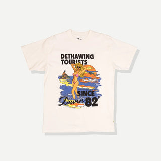 Duvin Tourist Tee in Antique with a colorful beach sunset graphic, a woman in a pink bikini, and Dethawing Tourists lettering