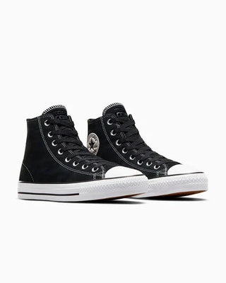 Black high-top sneakers with white soles on a white background
