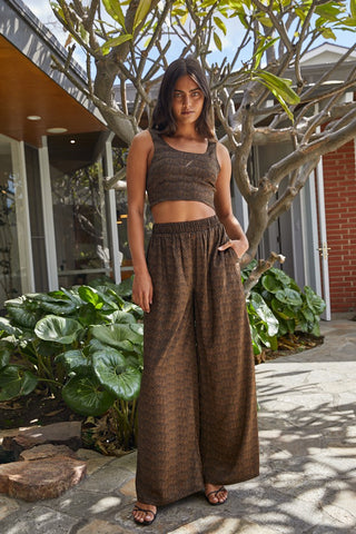 By Together Lilo Pants in black brown, woven poly satin, wide leg, high rise, relaxed silhouette.