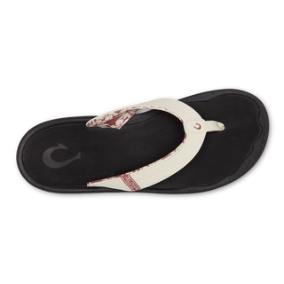 OluKai Women's 'Ohana Sandal in White Sand/Onyx — water-resistant synthetic straps, quick-drying jersey knit lining, EVA midsole with ICEVA footbed, and non-marking rubber outsole