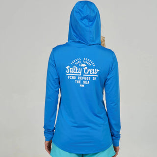 Bold blue Salty Crew hooded sunshirt with long sleeves, printed chest and back graphics, and lightweight stretch performance fabric.