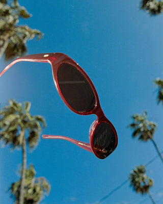 Crap Eyewear Mini Funk Sunglasses in Crystal Black Cherry Bio/Desert — undersized wraparound, bioacetate frames, CR-39 lenses, 100% UV protection, 5 barrel hinges