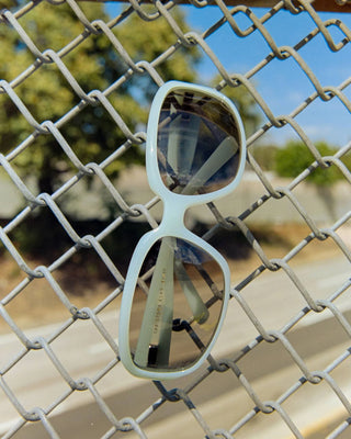 Crap Eyewear Stone Echo in Aqua Bio/Medium Smoke — bioacetate fashion wraparound, CR-39 lenses, 100% UV protection, spring hinges, wire cores, Rx-ready