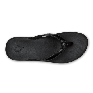 Olukai Puawe women's beach sandals, recovery-focused, puffy straps, foam cushioning, water-friendly, black.