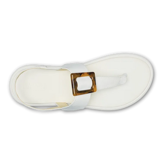 OluKai La'i T-Bar Women's Sandal in White/White — stretchable strap, tubular toe post, tortoise shell buckle, cushioned footbed, back strap design