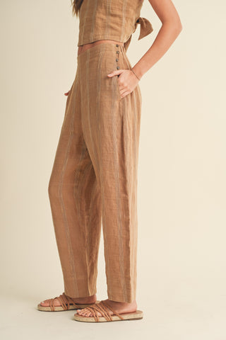 Miou Muse Straw-colored textured pants with side button details, linen-cotton-polyester blend.