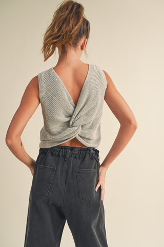 Gray MIOU MUSE cotton knit sweater vest with a twisted back design.