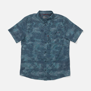 Dark navy Salty Crew Flagship UV button-up shirt with chest pocket, breathable vented back, and clean resin button finish.