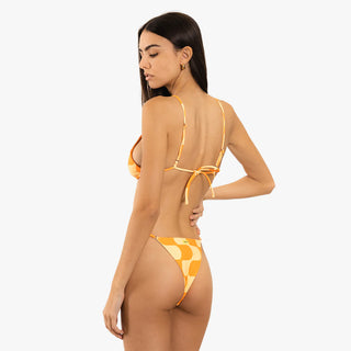 Duvin's Golden Hour Bottom available at Drift House, a cheeky bikini bottom with sliding fully adjustable sides and a classic design.