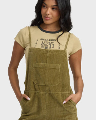 Billabong Wild Pursuit Cord Overall in Martini Olive cotton corduroy with multiple pockets and metal plate.