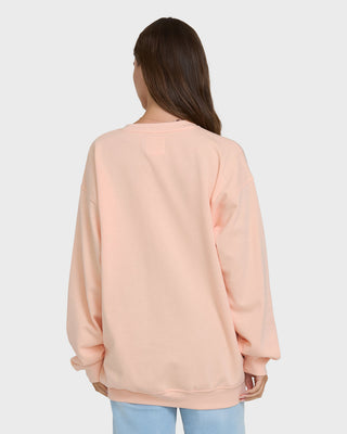 Billabong Chasing Horizons Crew Fleece in Light Peach, relaxed cotton-poly sweatshirt with crew neck and embroidery.