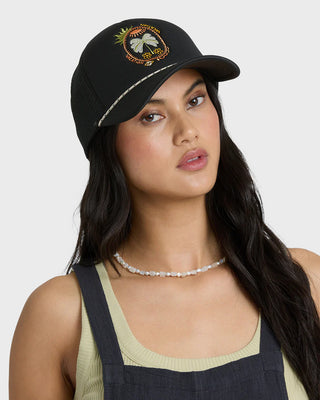 Off black Billabong trucker hat with embroidered graphic, curved bill, mesh back, and adjustable snapback closure.